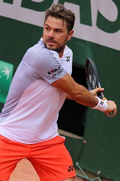Who did Stan Wawrinka partner with to win gold in doubles at the 2008 Beijing Olympics?