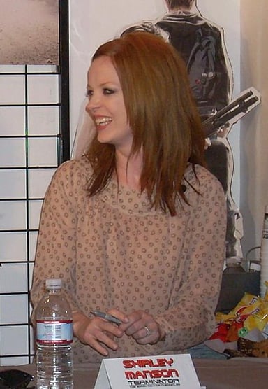 What is Shirley Manson's second home city?