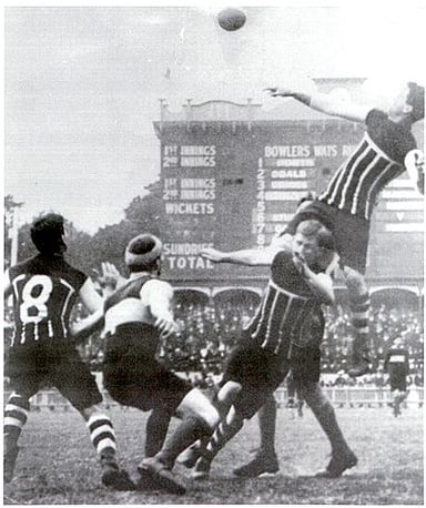 In which year did the Port Adelaide Football Club win its first AFL Premiership?