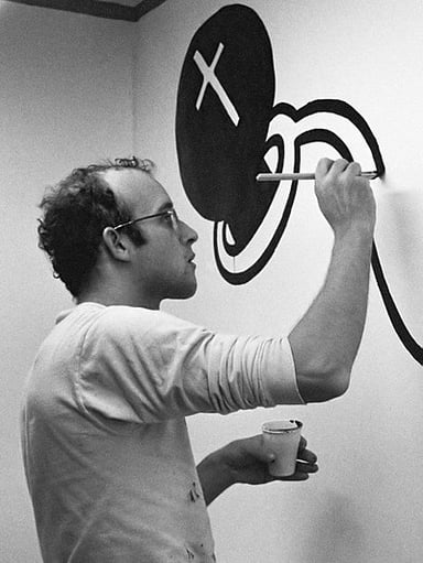 What theme is common in Haring's work?