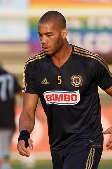 In which country did Onyewu start his professional career?