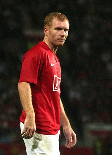 How many trophies did Scholes win with Manchester United in total?