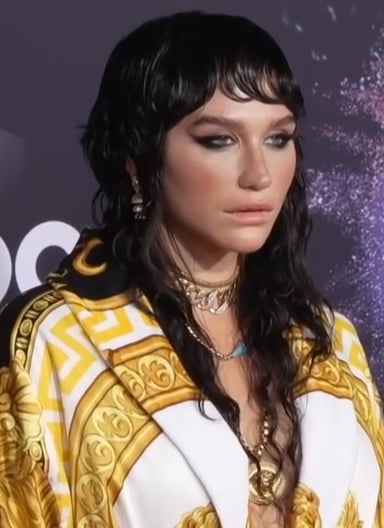 Which legal dispute halted Kesha's career between "Warrior" and "Rainbow"?