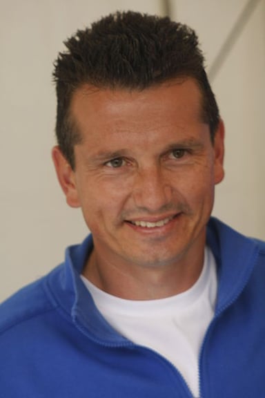 What type of court is Richard Krajicek known for excelling on?