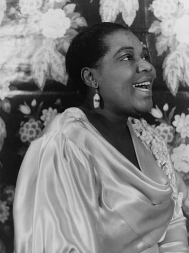 What age was Bessie Smith when she began her touring?