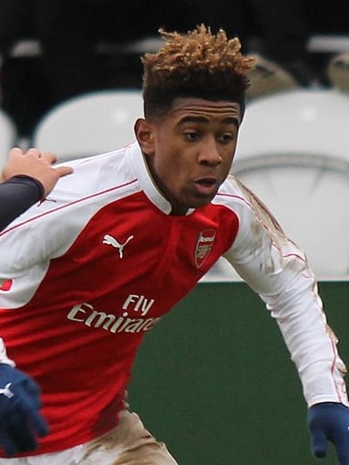 Against which team did Reiss Nelson score his first senior goal for Arsenal?