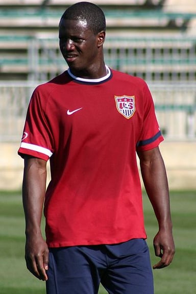 How old was Eddie Johnson when he started playing for United States men's national soccer team?