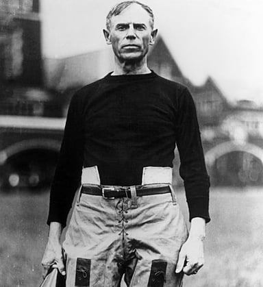During which century did John Heisman become prominent?