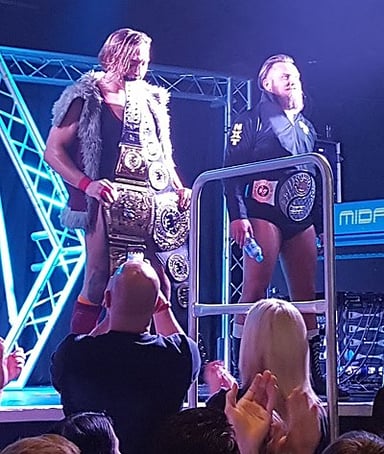 What wrestling style does Pete Dunne primarily focus on?
