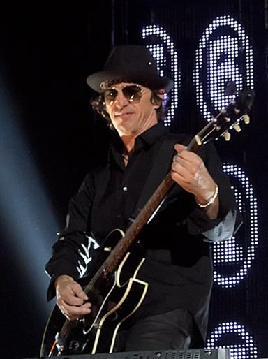 Which album marked Izzy Stradlin's last with Guns N' Roses before his departure?