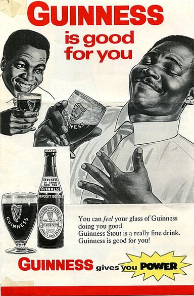 What gas mixture gives Guinness its thick, creamy head?