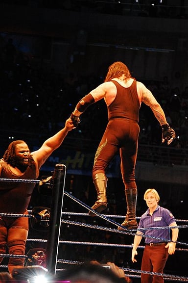 In which year did Mark Henry join the World Wrestling Federation (now WWE)?