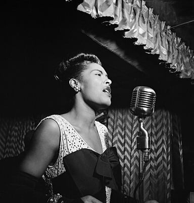 Which record labels did Billie Holiday have mainstream success with during the 1930s and 1940s?