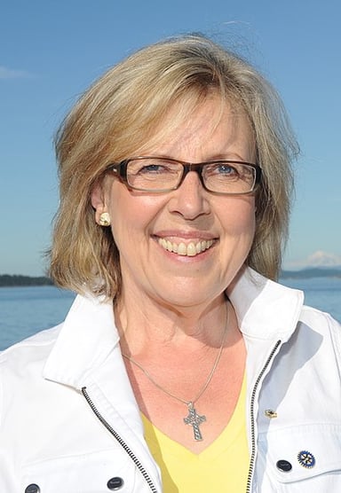 What international treaty was Elizabeth May deeply involved in negotiating?