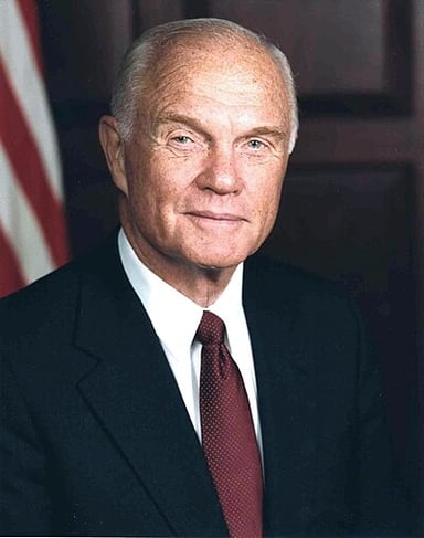 What is the religion or worldview of John Glenn?