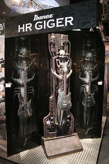 What is the primary theme of H.R. Giger's work?