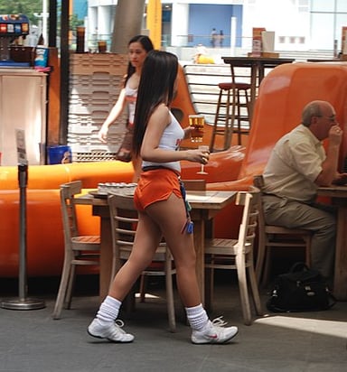 What are the female waiting staff at Hooters commonly referred to as?