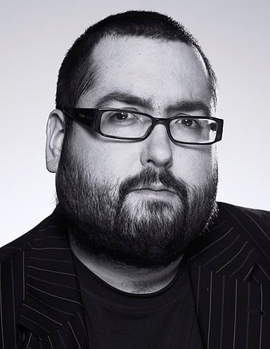 What is the full name of the comedian known as Ewen MacIntosh?