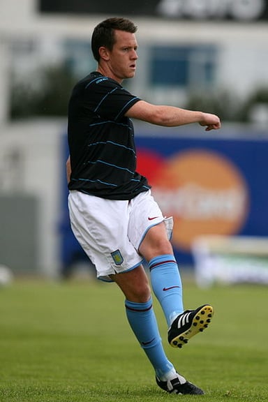At which club did Nicky Shorey start his professional career?