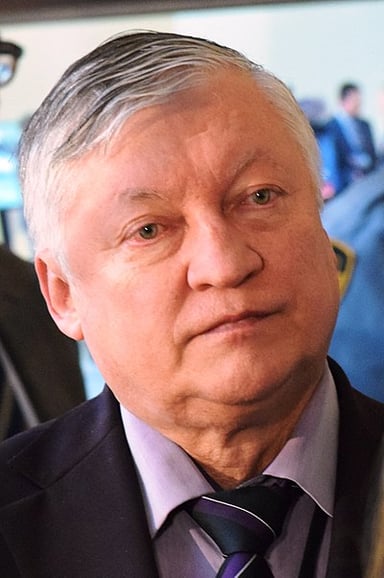 Which position does Karpov hold in the State Duma?