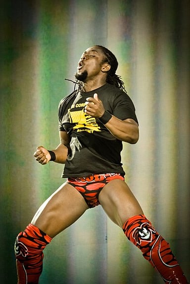 What is the name of the tag team Kofi Kingston is part of?