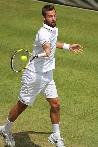 How many ATP doubles titles has Benoît Paire won?