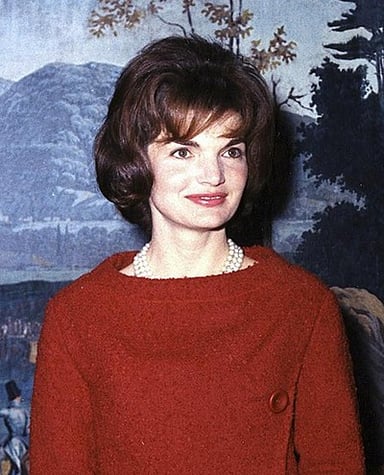 Which languages was Jacqueline Kennedy Onassis fluent in?