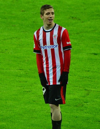 At what level did Iker Muniain make 59 appearances for Spain?