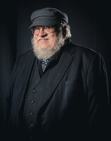 What genre does George R. R. Martin primarily write in?