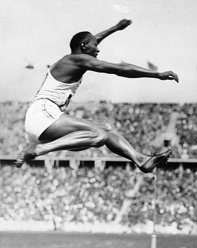 In which city was the 1935 Big Ten track meet, where Owens excelled, held?