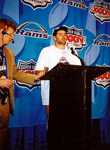 Kurt Warner's NFL career began undrafted, but with which team did he first sign?