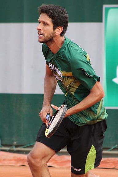 What is Marcelo Melo's specialty in tennis?