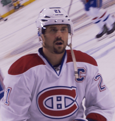 Which country does Brian Gionta represent in sports?