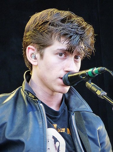 Which band is Alex Turner best known for fronting?