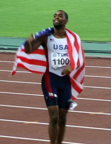 In 2009, what was Tyson Gay's rank in 100m according to the IAAF?