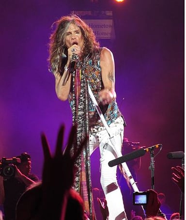 Which band did Steven Tyler collaborate with on the song "Just Feel Better"?