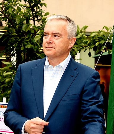 Which major royal event did Huw Edwards present for the BBC?