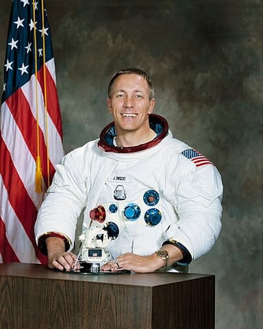Swigert held what record for distance from Earth?