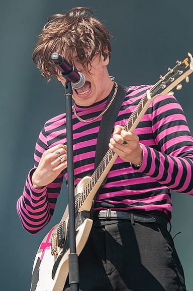 Yungblud's style can also be described as a mix of hip-hop and what?