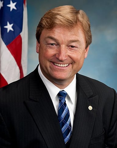 Between 1995 and 2007, what was Dean Heller's role?