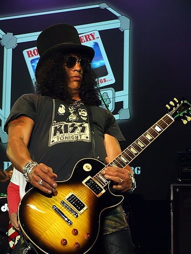 Who is the lead singer of Slash's band with Myles Kennedy and the Conspirators?