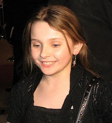What is the profession of Abigail Breslin?