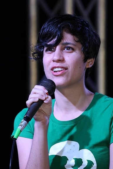 What is the profession of Ashly Burch besides being a singer?