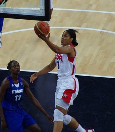 Moore is one of 11 women to earn an Olympic gold medal, a Fiba World cup gold, a NCAA Championship, and what other title?