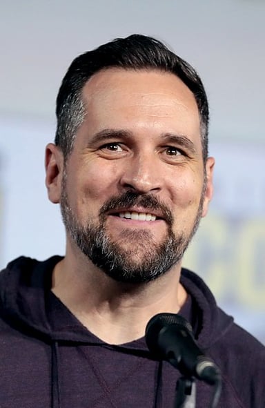What is Travis Willingham's primary occupation?