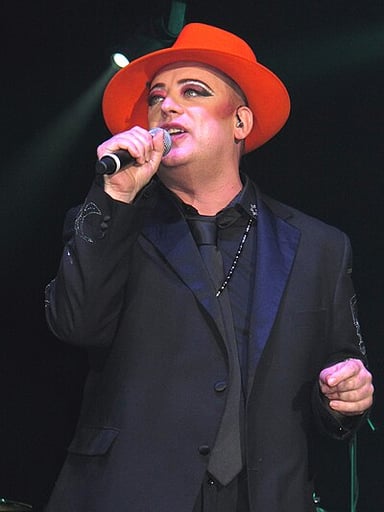 How many singles has Boy George released as a solo artist?