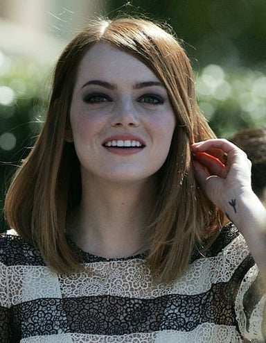 What was Emma Stone's first acting role?