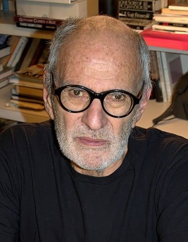 In what year did Larry Kramer help found the GMHC?