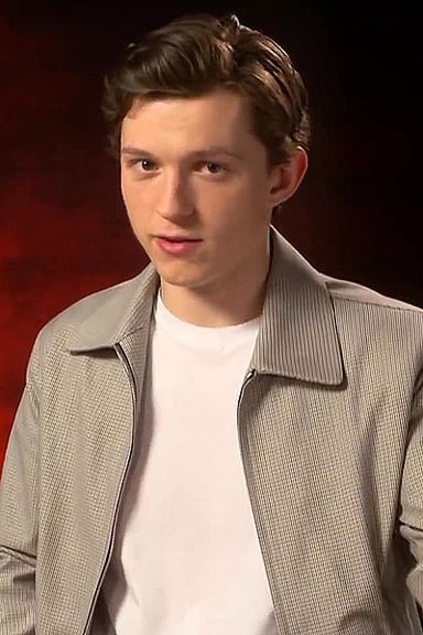 What was Tom Holland's first film role?