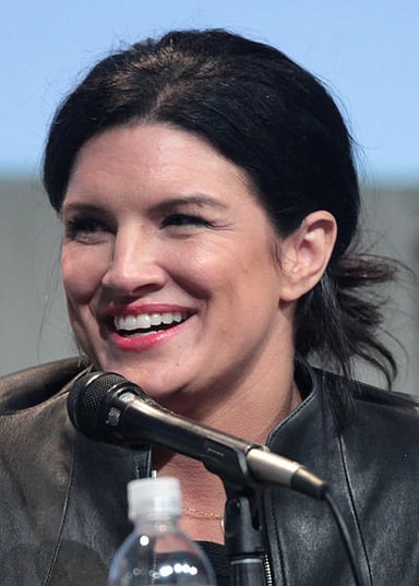 Who did Gina Carano fight against in the first major MMA women's headline event?